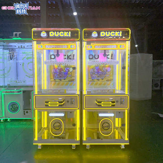 Hot -selling Amusement Park Game Hall Gift Toy Machine Wholesale Coin Clip Has a Prize Game Console