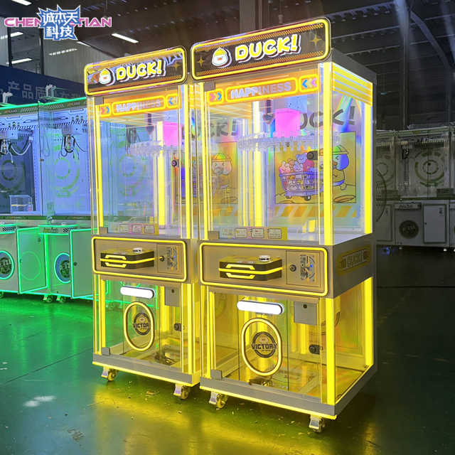 Hot -selling Amusement Park Game Hall Gift Toy Machine Wholesale Coin Clip Has a Prize Game Console